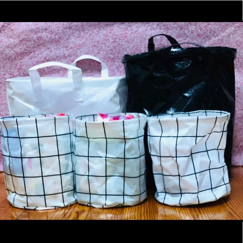 5 collapsible bins (2 large white/black) (3 small white plaid bin)